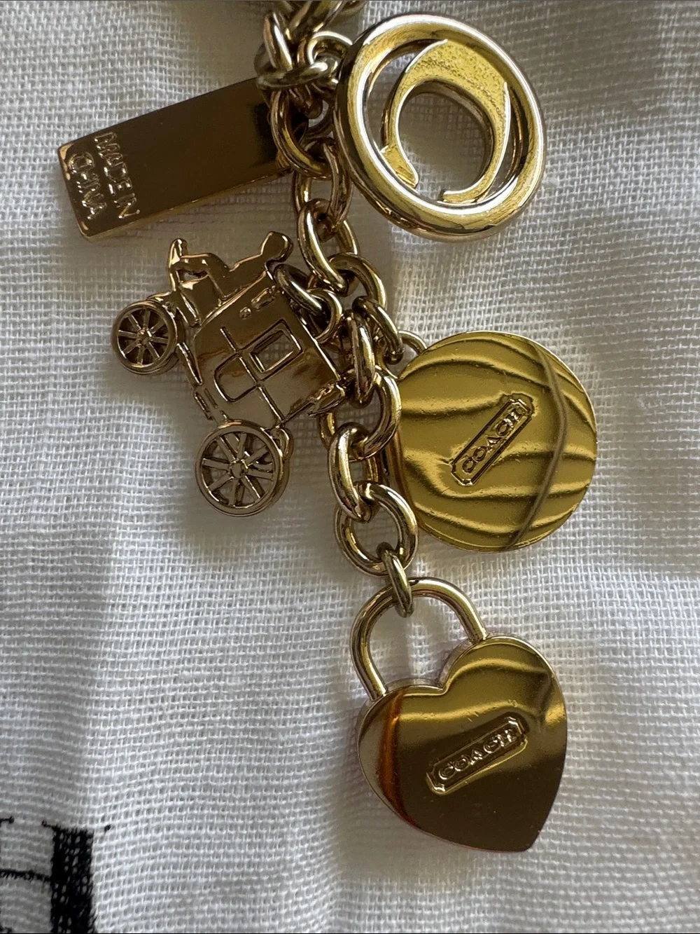 Coach Gold-Tone Multi Charm Keychain with Pink Heart and Red Tag